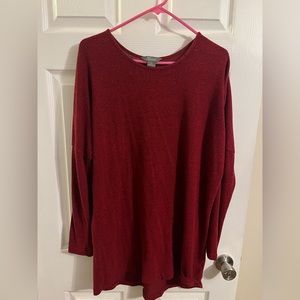 red tunic / sweater dress with black accent.